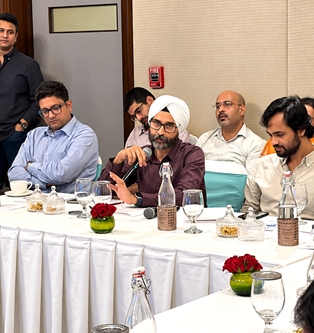 Attendees sharing a conversation at the summit